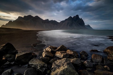 Mountains, mountain range, beach, sea, waves, surf, reflection, clouds, evening light, coast,