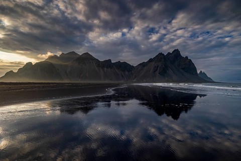 Mountains, mountain range, beach, sea, waves, surf, reflection, clouds, evening light, coast,