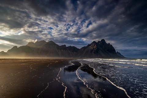 Mountains, mountain range, beach, sea, waves, surf, reflection, clouds, evening light, coast,
