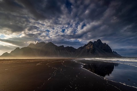 Mountains, mountain range, beach, sea, waves, surf, reflection, clouds, evening light, coast,