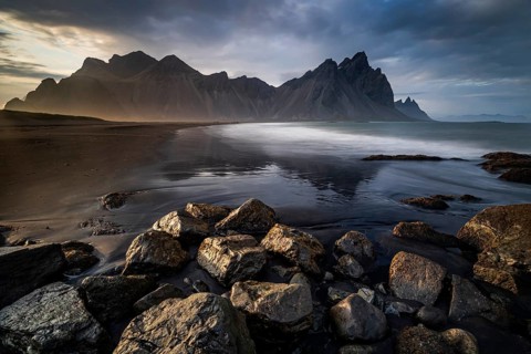 Mountains, mountain range, beach, sea, waves, surf, reflection, clouds, evening light, coast,