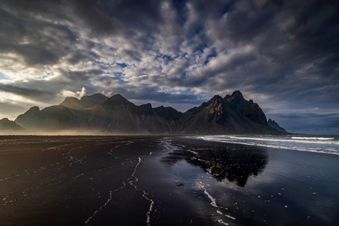 Mountains, mountain range, beach, sea, waves, surf, reflection, clouds, evening light, coast,
