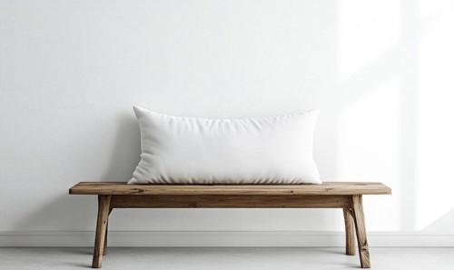 A minimalist wooden bench with a white pillow, bathed in natural light. AI generated