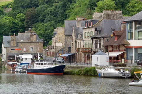Idyllic scenery at the port of Dinan, a town in Brittany, France. It is located at the river Rance