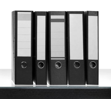 Some Folders on desk surface in white back