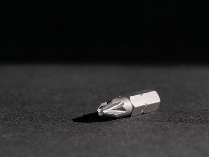 Closeup shot of a screwdriver bit in dark ambiance