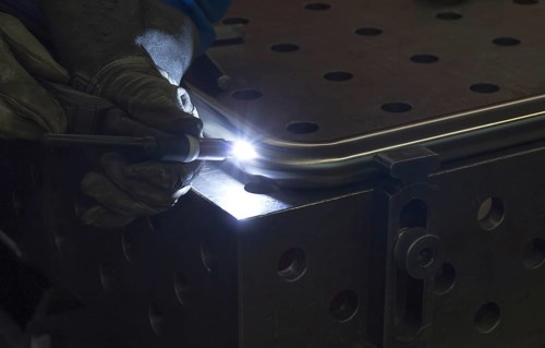 Closeup welding scenery in metallic ambiance