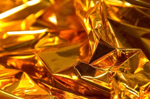 Full frame creased gold foil background