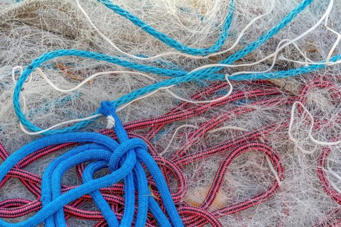 Full frame picture showing a tangled fishing net