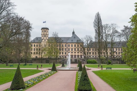 Park around a historic building named Stadtschloss in Fulda, a city in Hesse, Germany