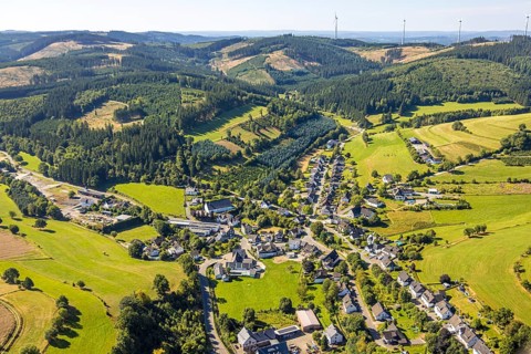 Aerial view, residential area local view district Heinsberg with Schützenhalle, forest area with