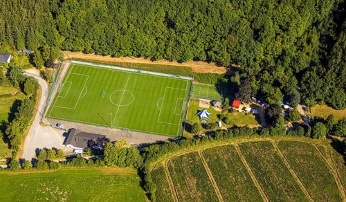 Aerial view, football stadium sports field Vor der Höh, SG Albaum/Heinsberg, sunshades in a meadow,