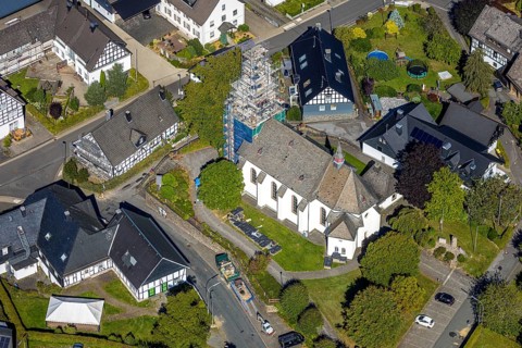 Aerial view, construction site and renovation work on the church tower of the Catholic parish