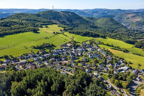 Aerial view, residential area, view of Halberbracht district with wooded hilly landscape and forest
