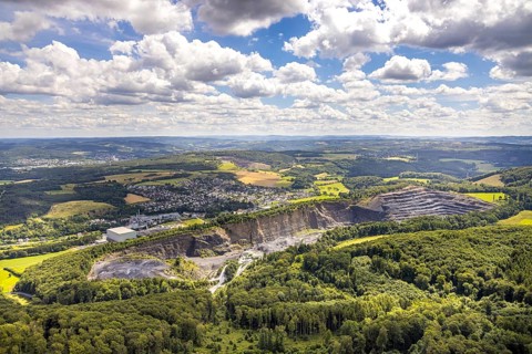 Aerial view, quarry Ebel Steinbruchbetriebe Werk Habbel, distant view and blue sky with clouds,