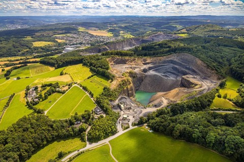 Aerial view, quarry Am Teussenberg, Ebel Steinbruchbetriebe Werk SBH, meadows and forest, distant