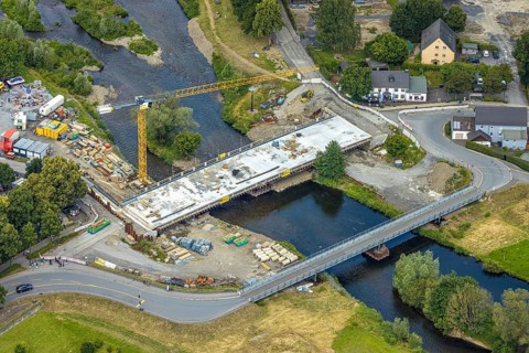 Aerial view, temporary bridge and construction site with new construction of the Dinscheder