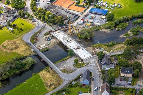 Aerial view, temporary bridge and construction site with new construction of the Dinscheder