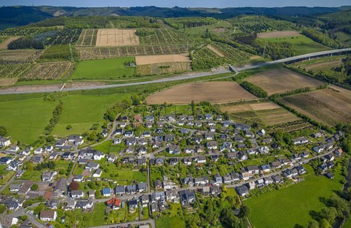 Aerial view, residential area, view of Velmede district surrounded by meadows and fields, tree