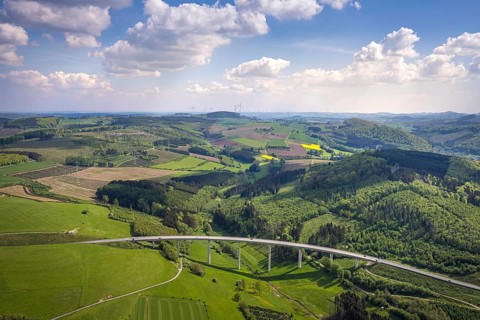 Aerial view, valley bridge Schormecke of the federal road B480 near Nuttlar, hilly landscape with