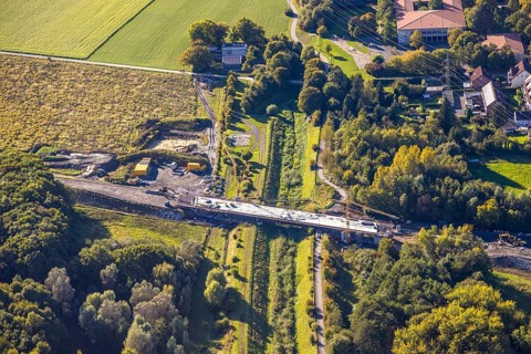 Aerial view, bypass construction site with bridge construction of the state road L821n over the