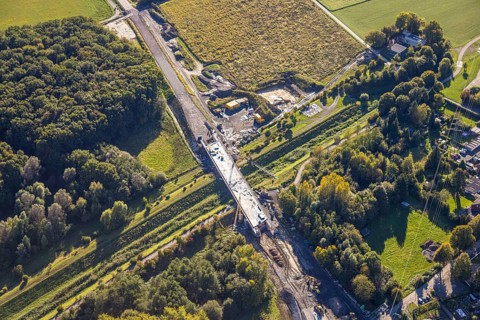 Aerial view, bypass construction site with bridge construction of the state road L821n over the