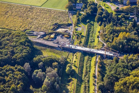 Aerial view, bypass construction site with bridge construction of the state road L821n over the