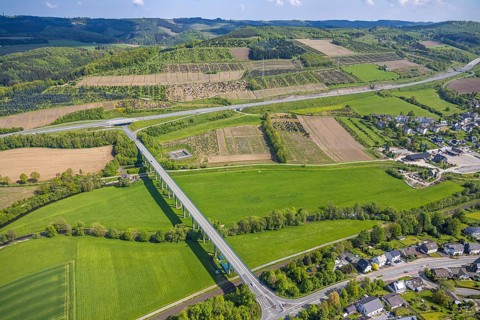 Aerial view, Ruhr valley bridge Velmede and motorway A46 junction Bestwig, tree plantations meadows