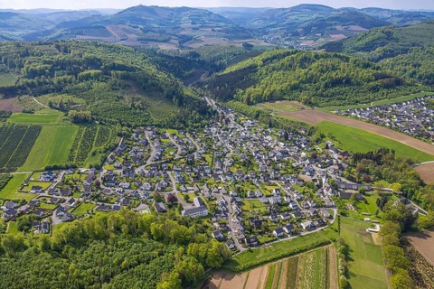 Aerial view, wooded hilly landscape, mountains and valleys, residential area local view district