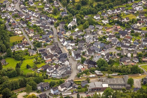 Aerial view, evang. Church and half-timbered houses, local view residential area on