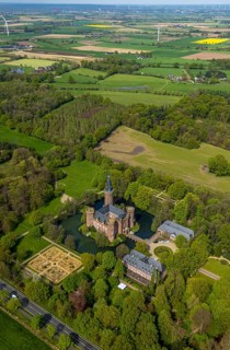 Aerial view, Museum Schloss Moyland, neo-Gothic moated castle and castle park surrounded by meadows