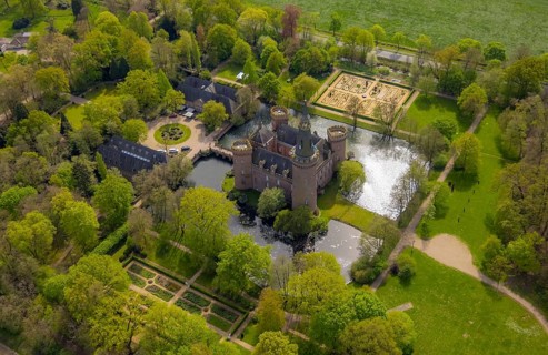 Aerial view, Museum Schloss Moyland, neo-Gothic moated castle and castle park surrounded by meadows