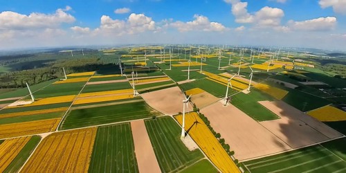 Aerial view, wind farm and wind farm, wind turbine, wind turbines and tiled meadows and fields near