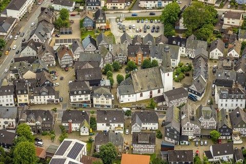 Aerial view, protestant town church and church square in the town centre with historic