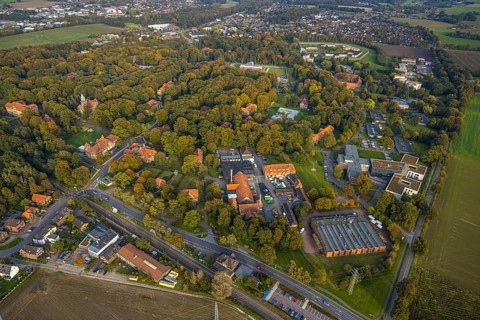 Aerial view, view LVR clinic in autumnal forest, Hau, Bedburg-Hau, autumnal forest, Lower Rhine,