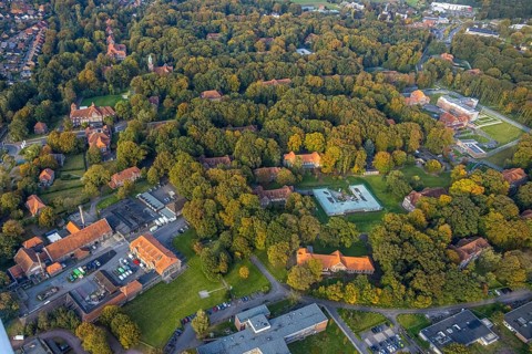 Aerial view, view LVR clinic in autumnal forest, new building, Hau, Bedburg-Hau, autumnal forest,