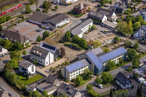 Aerial view, municipal administration town hall Bestwig with solar roof, town hall square, Lidl