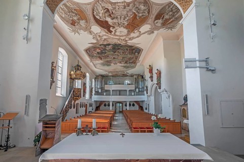 Interior of the Roman Catholic parish church of the Assumption of the Virgin Mary with organ loft