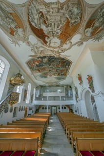 Interior of the Roman Catholic parish church of the Assumption of the Virgin Mary with organ loft