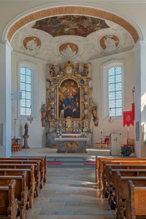 Interior of the Roman Catholic parish church of the Assumption of the Virgin Mary, main altar with