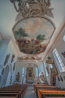 Interior of the Roman Catholic parish church of the Assumption of the Virgin Mary with ceiling