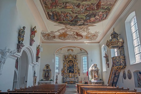 Interior of the Roman Catholic parish church of the Assumption of the Virgin Mary with ceiling