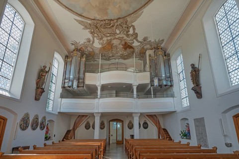 Interior of the Roman Catholic parish church of the Assumption of the Virgin Mary with organ loft