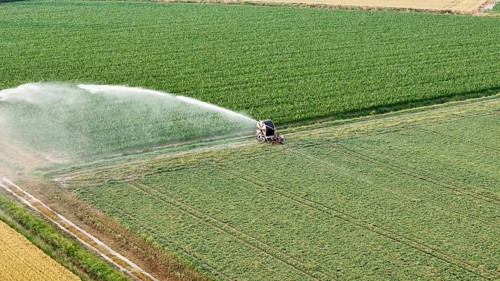 Modern agricultural technology ensures essential water supply for soybean crops during springtime
