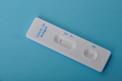 Covid-19 self-test on a blue background
