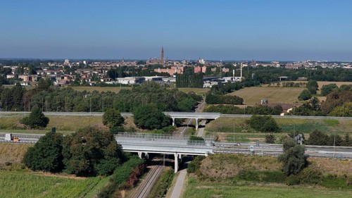 Panoramic view of Cremona skyline and agricultural landscape near a Northern Italian city under a