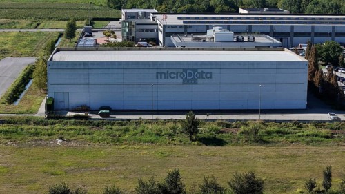 Cremona, Italy August 22nd 2025 Aerial view revealing MicroData Group headquarters, massive data