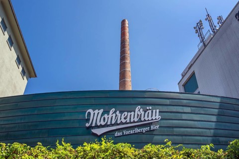 Façade with chimney and antennas, Mohrenbräu, Dornbirn, Vorarlberg, Austria