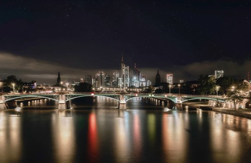 Frankfurt skyline, Main bridge and river at night under the stars, city centre, Frankfurt am Main,