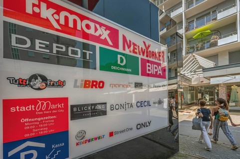 Sign with advertising and logos, Dornbirn, Vorarlberg, Austria